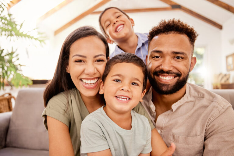 Photo of a smiling family enjoying their home after AC repair.
